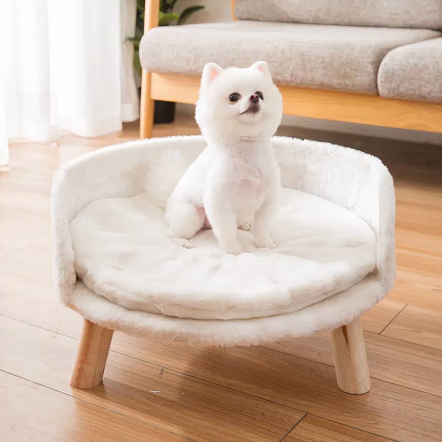 Canapé pour chien rond et blanc avec pieds en bois