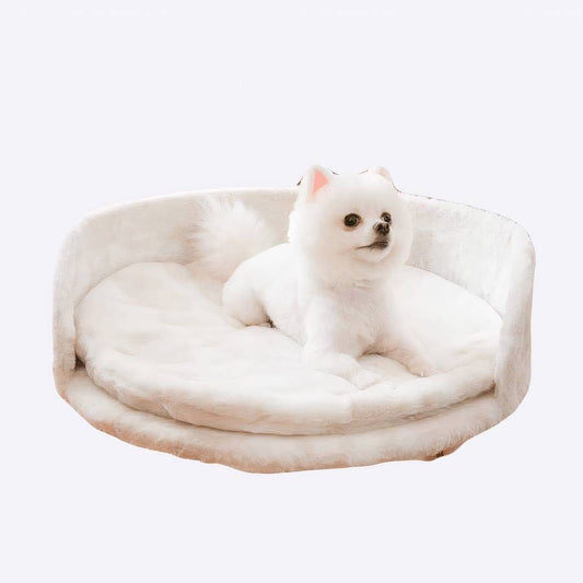 Canapé pour chien rond et blanc avec pieds en bois